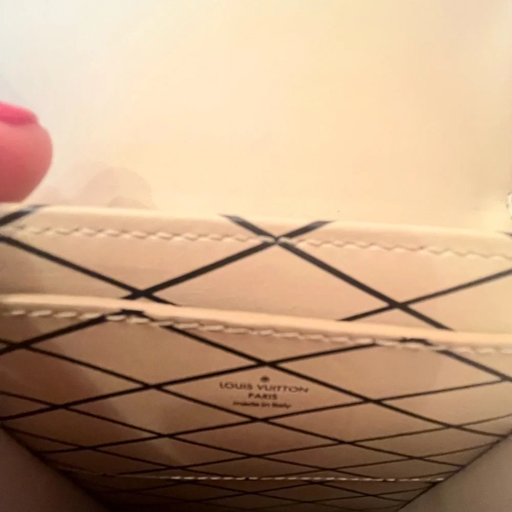 Authentic, like new Louis Vuitton LV Monogram Trunk Pochette Vertical - Picture 9 of 11